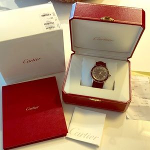 Men’s Cartier watch.